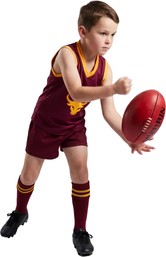Young player hitting a handball